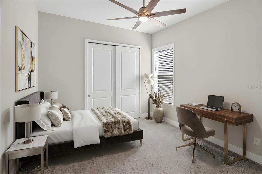 11992 Southwest 32nd Lane Gainesville, FL 32608 - Photo 16 of 29 a bedroom with bed and a window