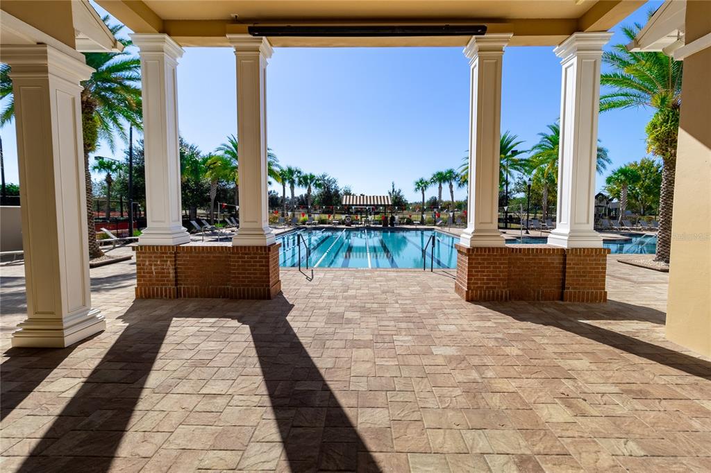 11992 Southwest 32nd Lane Gainesville, FL 32608 - Photo 26 of 29 a view of a patio with couches and potted plants