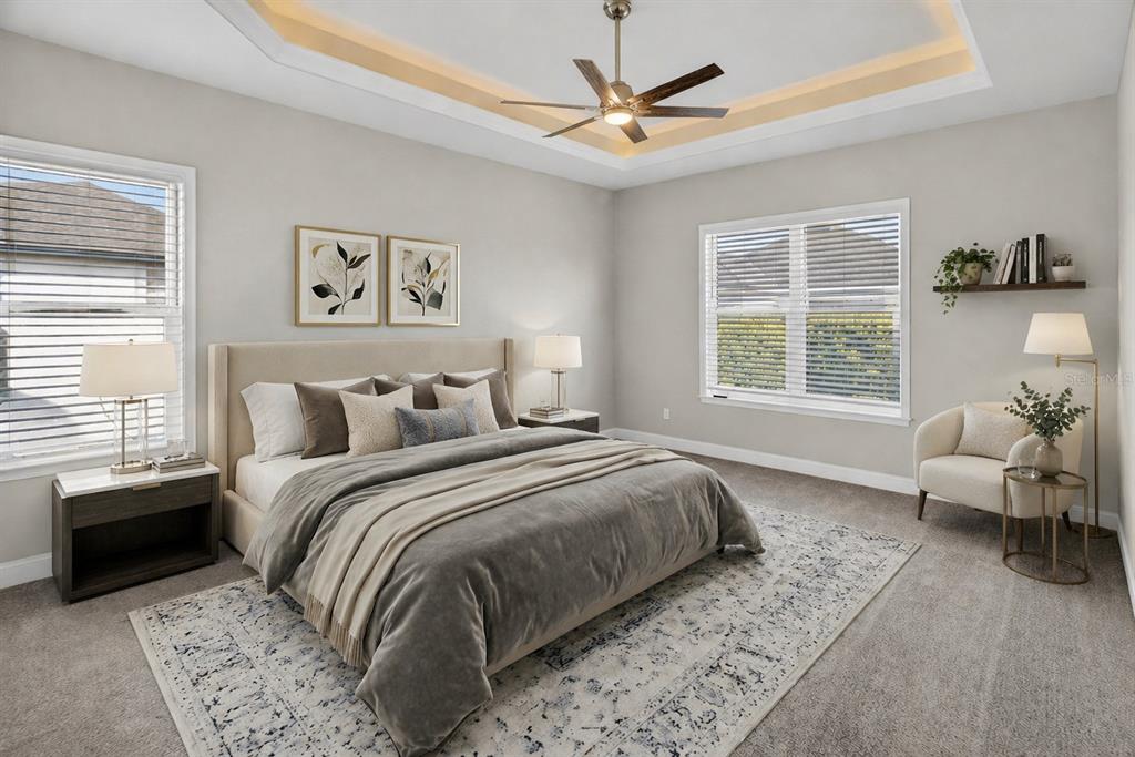 11992 Southwest 32nd Lane Gainesville, FL 32608 - Photo 10 of 29 a bedroom with a large bed and a window