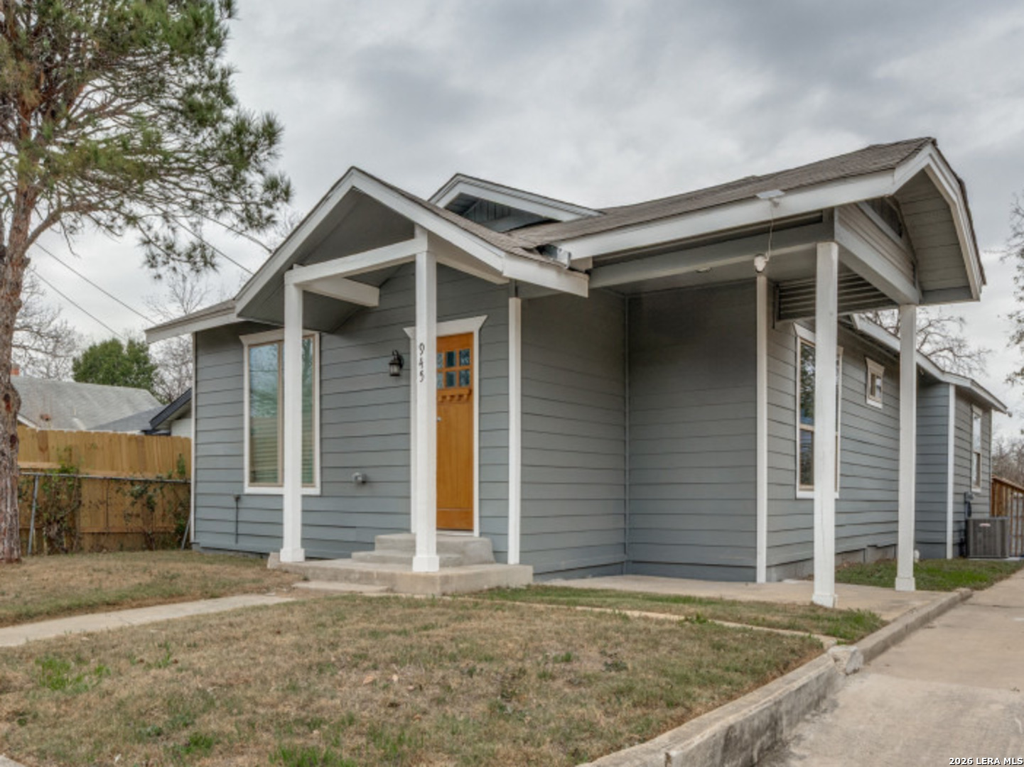a front view of a house with garage