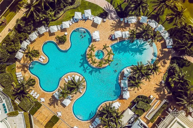 a bed room with furniture and a lamp