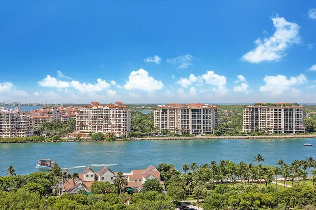 a view of a lake with a city view