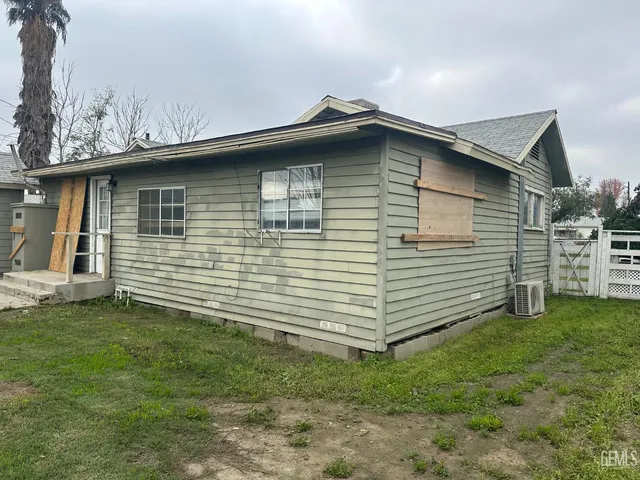 a front view of a house with garage