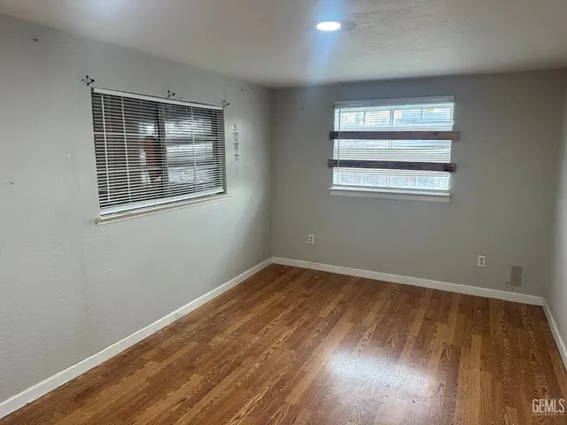 a view of staircase with white walls
