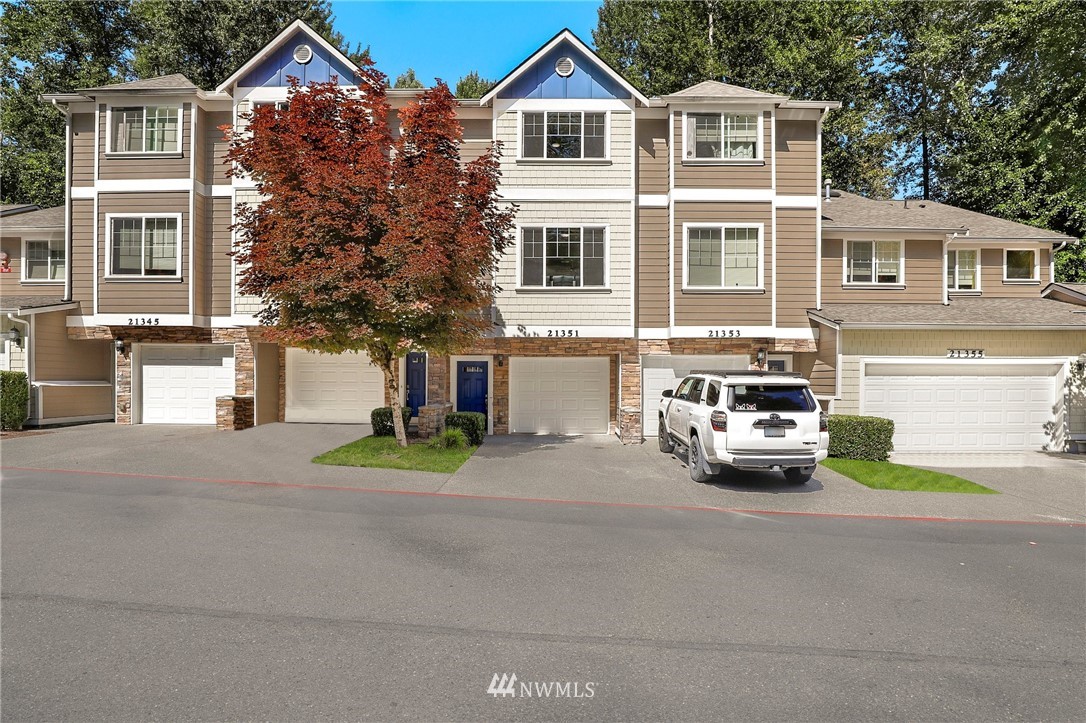 21351 11th Drive Southeast Bothell, WA 98021 - Photo 1 of 33 a car parked in front of a house
