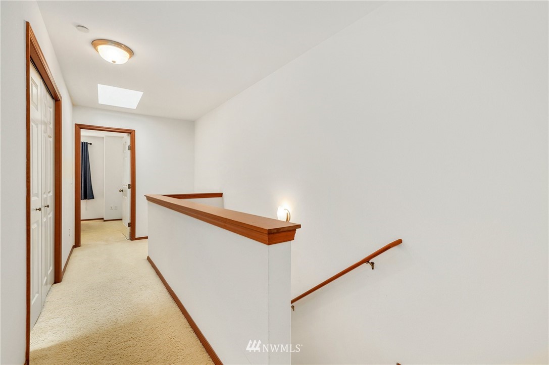 21351 11th Drive Southeast Bothell, WA 98021 - Photo 18 of 33 a view of a hallway with staircase
