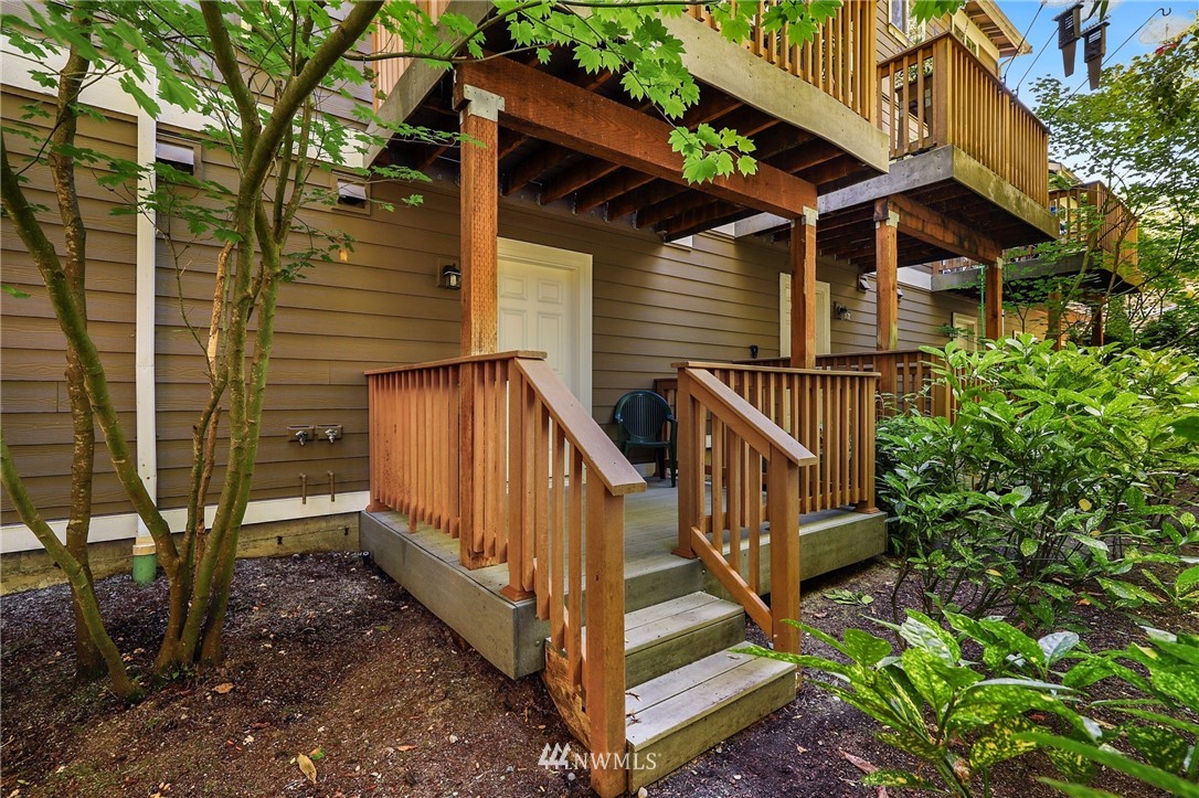 21351 11th Drive Southeast Bothell, WA 98021 - Photo 29 of 33 a view of wooden house with large windows and stairs