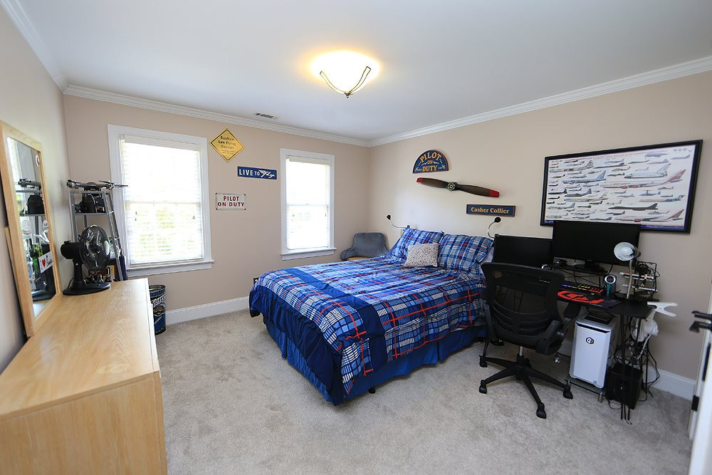9101 Tealby Place Raleigh, NC 27615 - Photo 21 of 30 Bedroom with crown and new carpet floors, Bedroom
