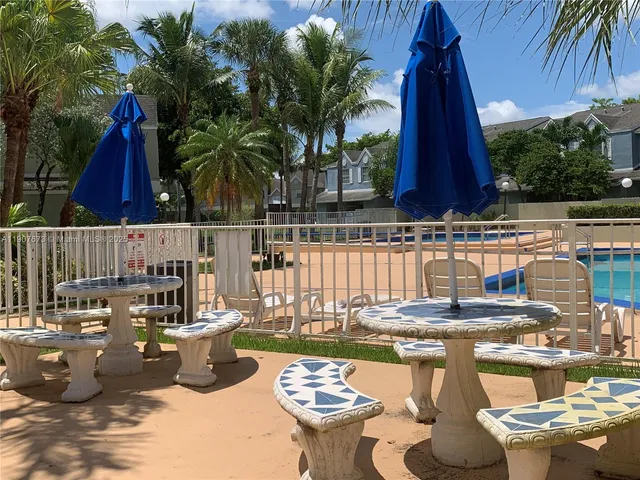 a kitchen with a sink and a stove