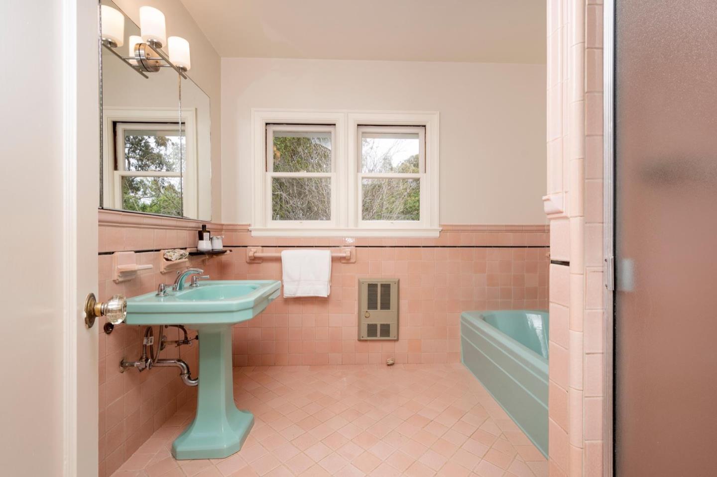 900 Link Road Hillsborough, CA 94010 - Photo 32 of 52 a bathroom with a sink a bathtub and a window