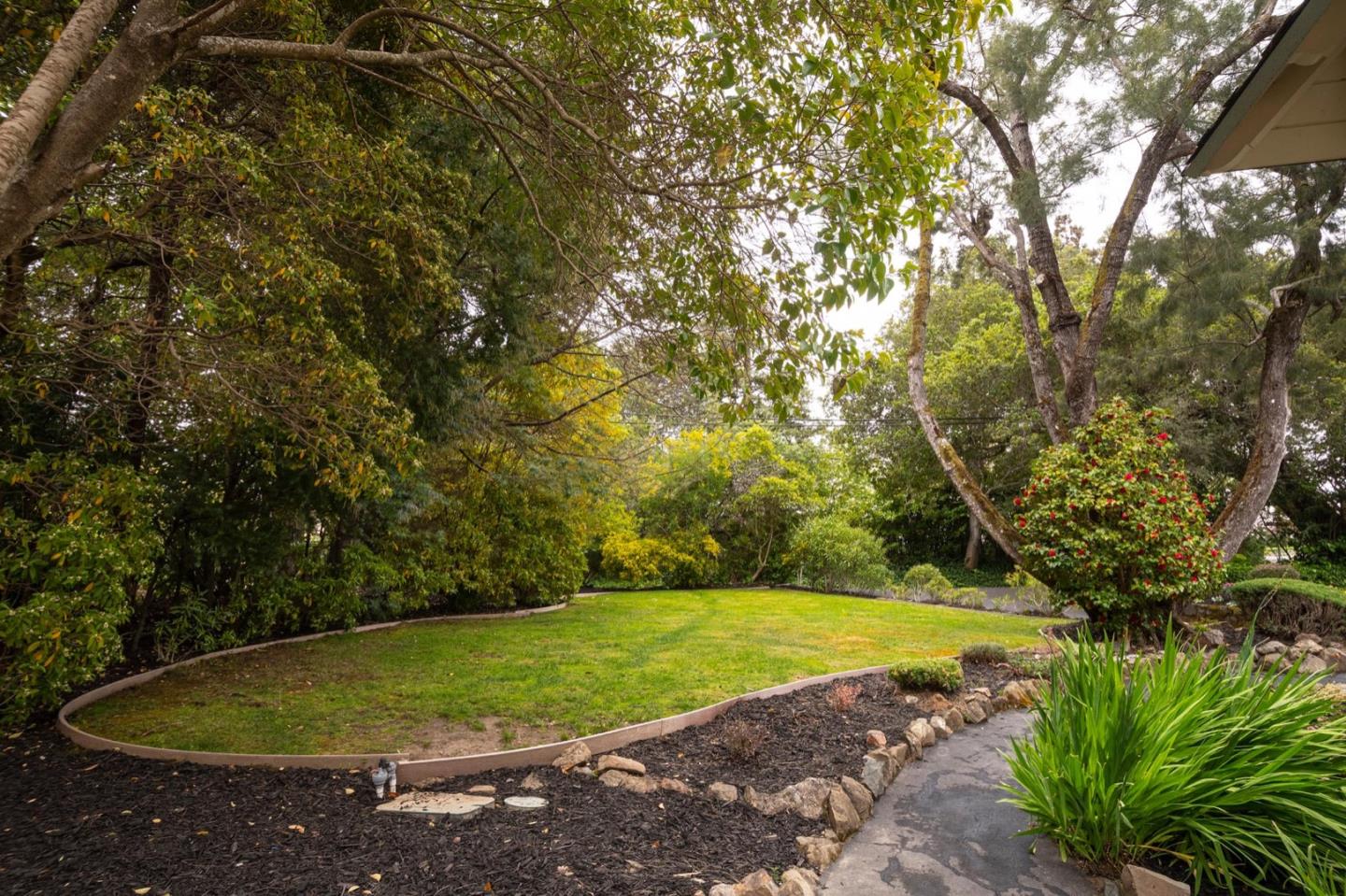900 Link Road Hillsborough, CA 94010 - Photo 41 of 52 a view of a backyard with a small yard