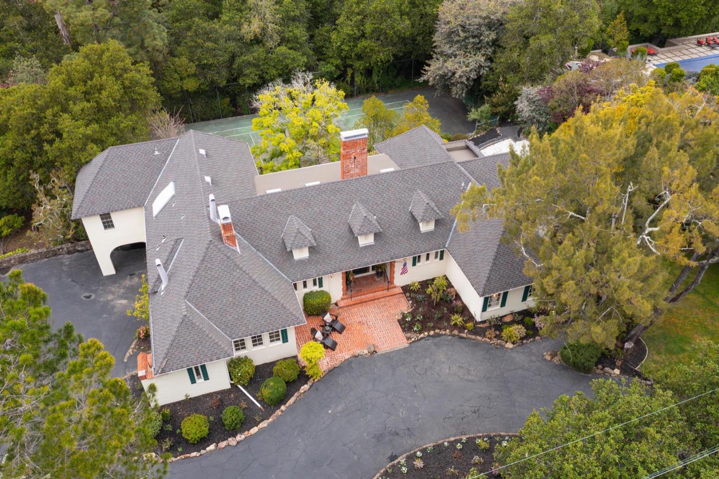 900 Link Road Hillsborough, CA 94010 - Photo 45 of 52 an aerial view of a house with a yard basket ball court and outdoor seating