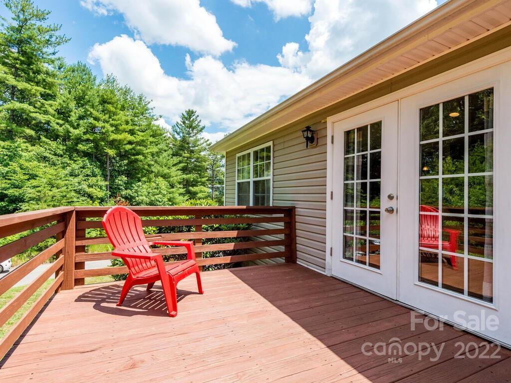 243 Scarlett Ridge Drive Marshall, NC 28753 - Photo 35 of 36 a view of outdoor sitting area with chairs