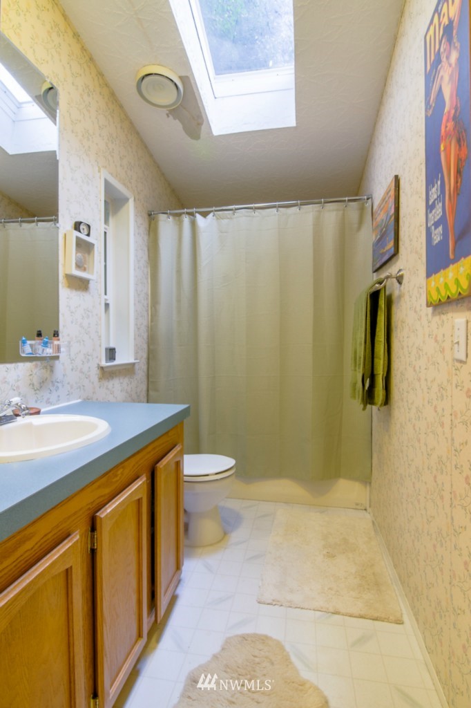 3554 Loomis Trail Road Blaine, WA 98230 - Photo 11 of 23 a bathroom with a sink a toilet and shower