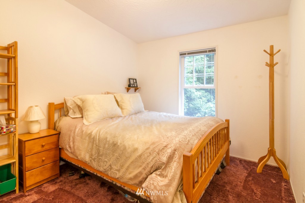 3554 Loomis Trail Road Blaine, WA 98230 - Photo 12 of 23 a bedroom with a bed and a window