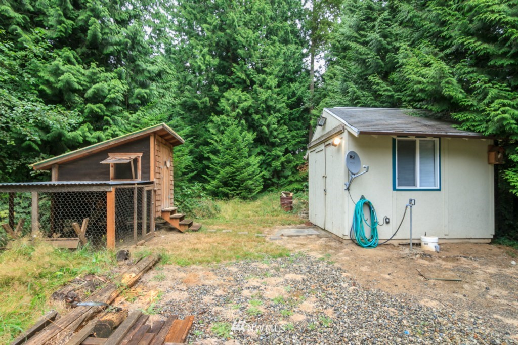 3554 Loomis Trail Road Blaine, WA 98230 - Photo 22 of 23 a house with trees in the background