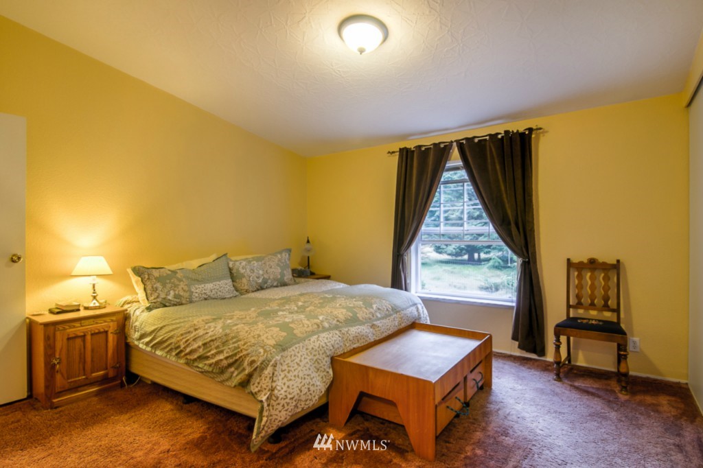 3554 Loomis Trail Road Blaine, WA 98230 - Photo 8 of 23 a bedroom with a bed and a window
