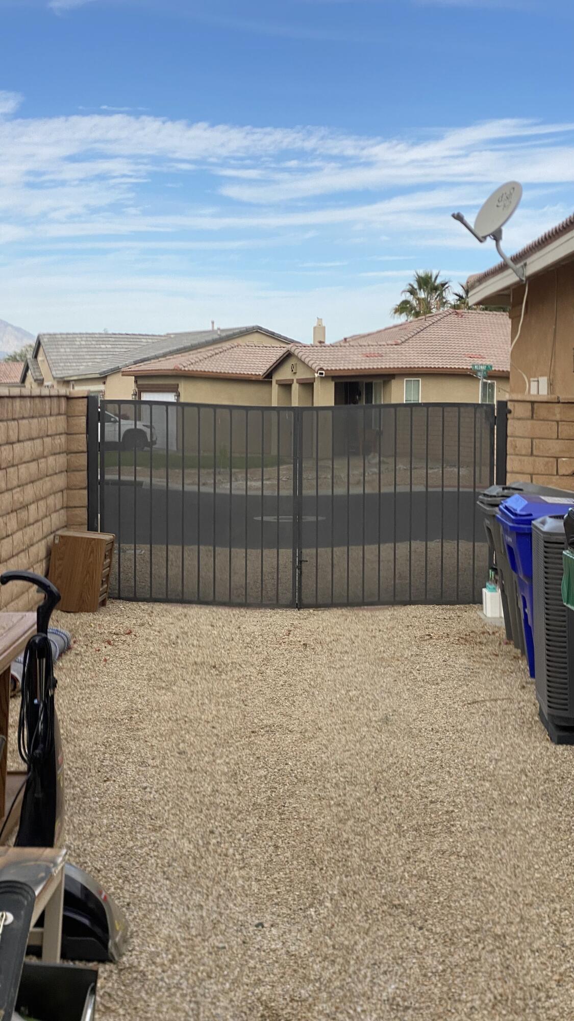 37894 Medway Street Indio, CA 92203 - Photo 24 of 27 a bathroom with a shower
