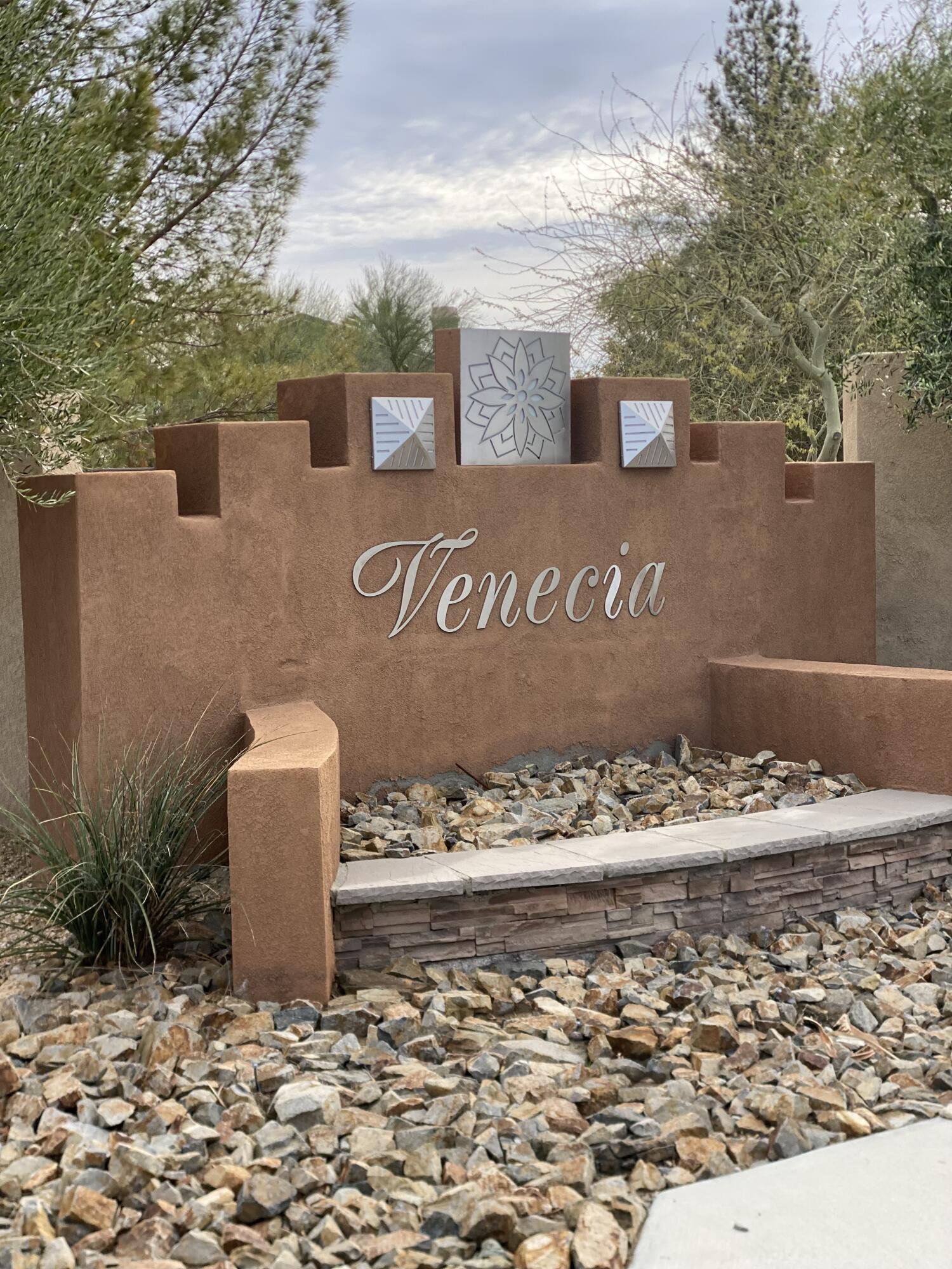 37894 Medway Street Indio, CA 92203 - Photo 3 of 27 a sign board with a building in the background