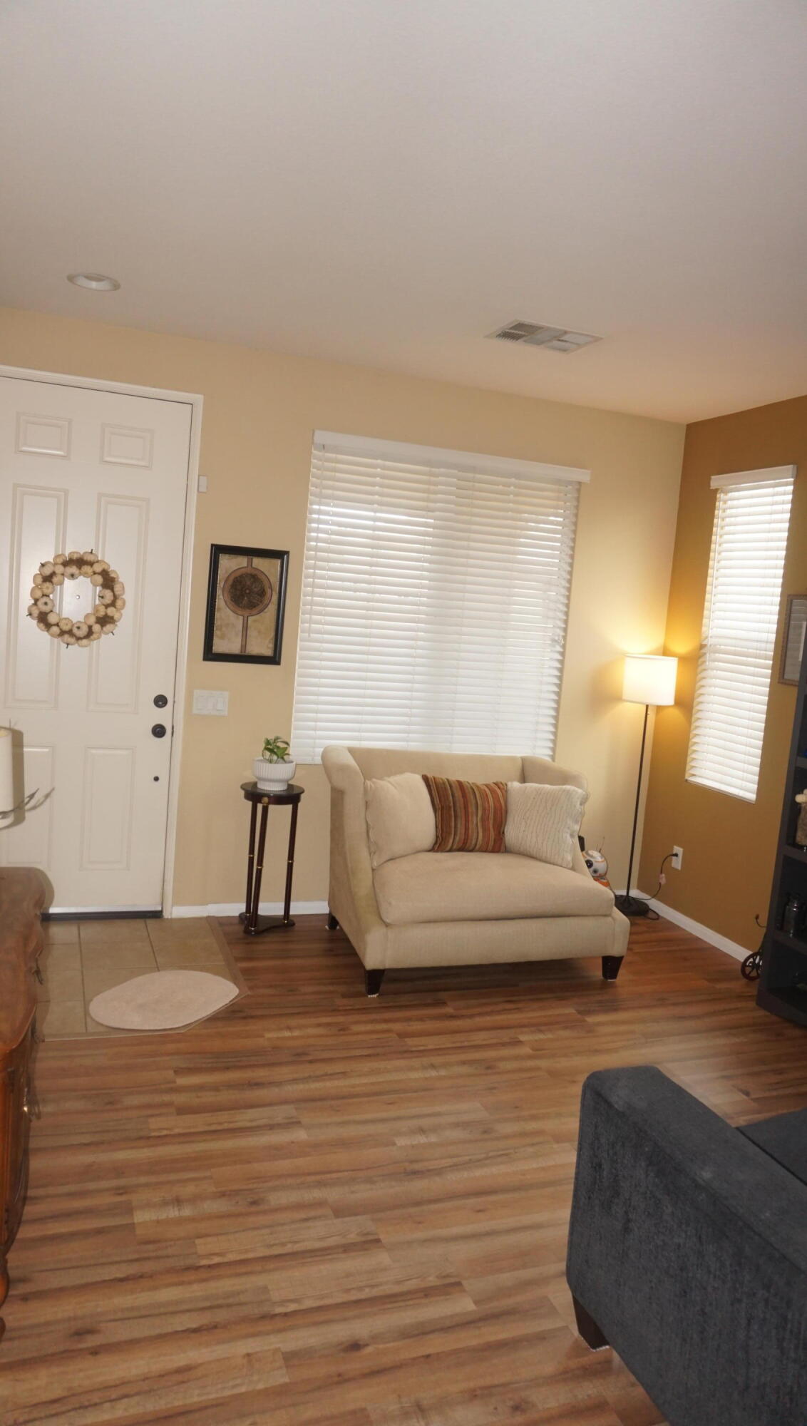 37894 Medway Street Indio, CA 92203 - Photo 4 of 27 a living room with furniture and a wooden floor