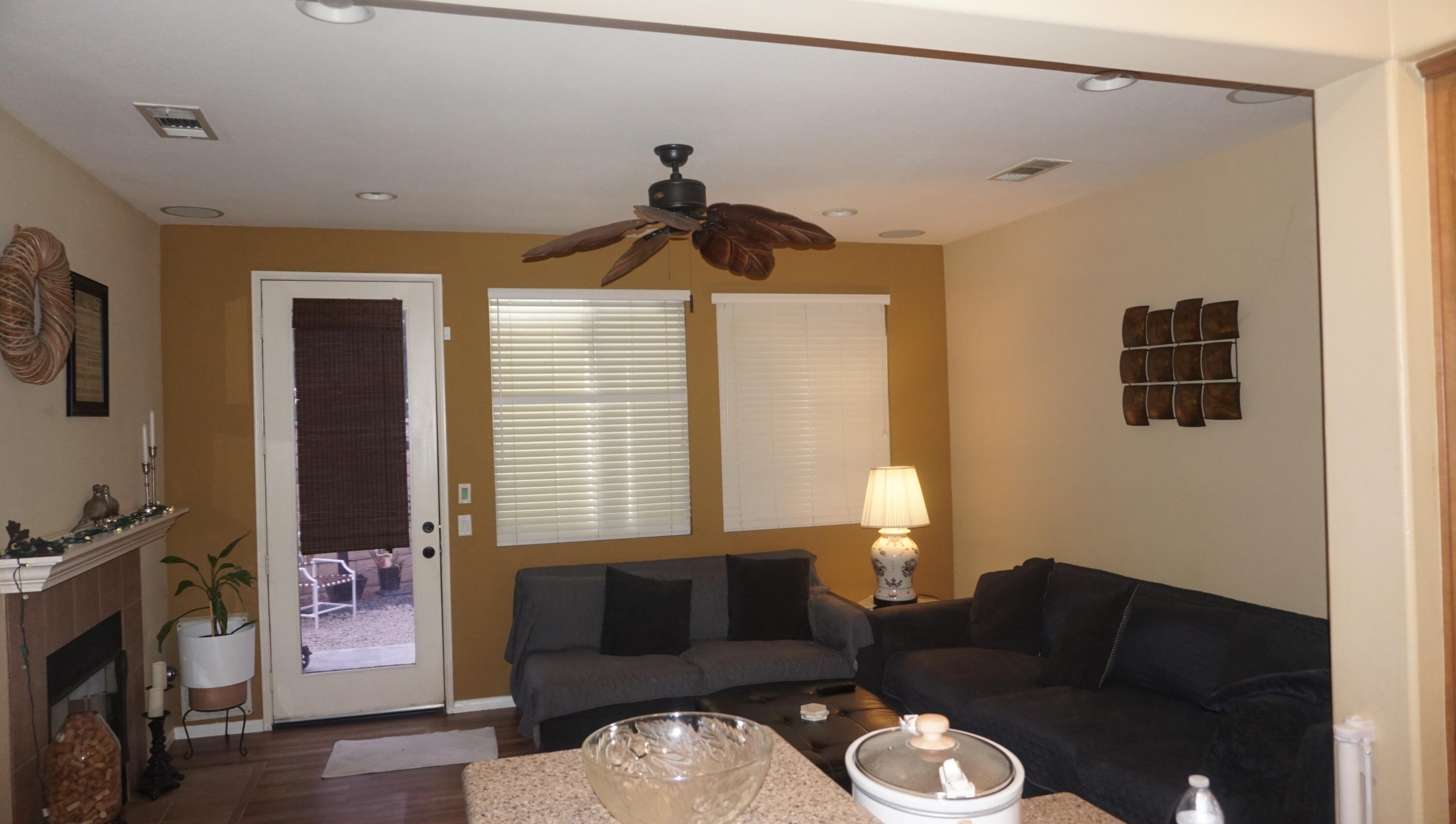 37894 Medway Street Indio, CA 92203 - Photo 6 of 27 a living room with furniture and a fireplace