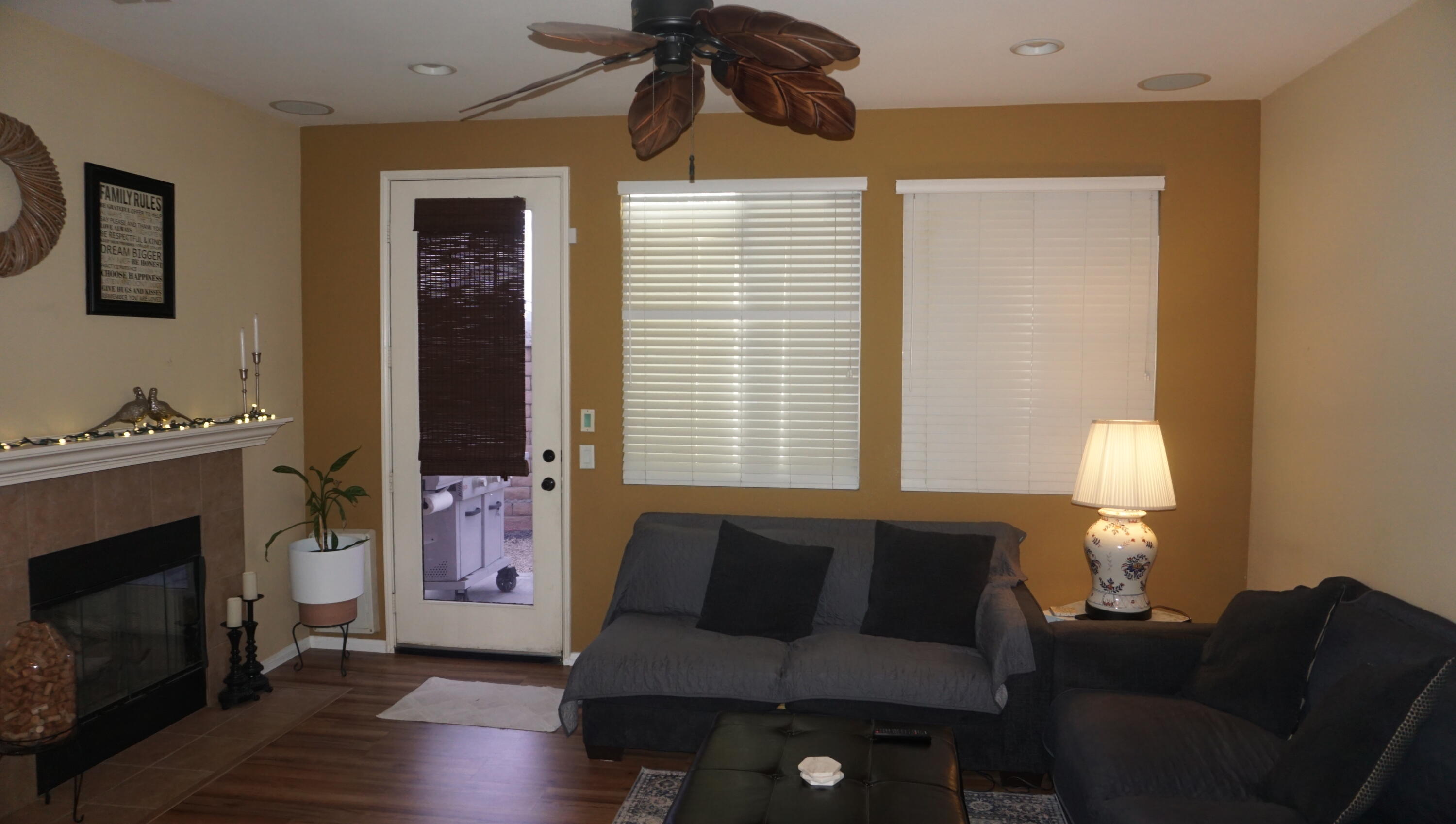 37894 Medway Street Indio, CA 92203 - Photo 8 of 27 a living room with furniture and a fireplace