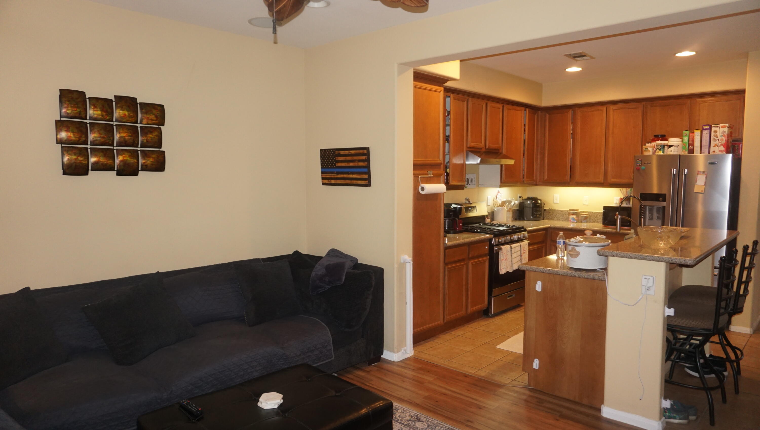 37894 Medway Street Indio, CA 92203 - Photo 10 of 27 a kitchen with stainless steel appliances granite countertop a refrigerator a stove top oven a sink and dishwasher