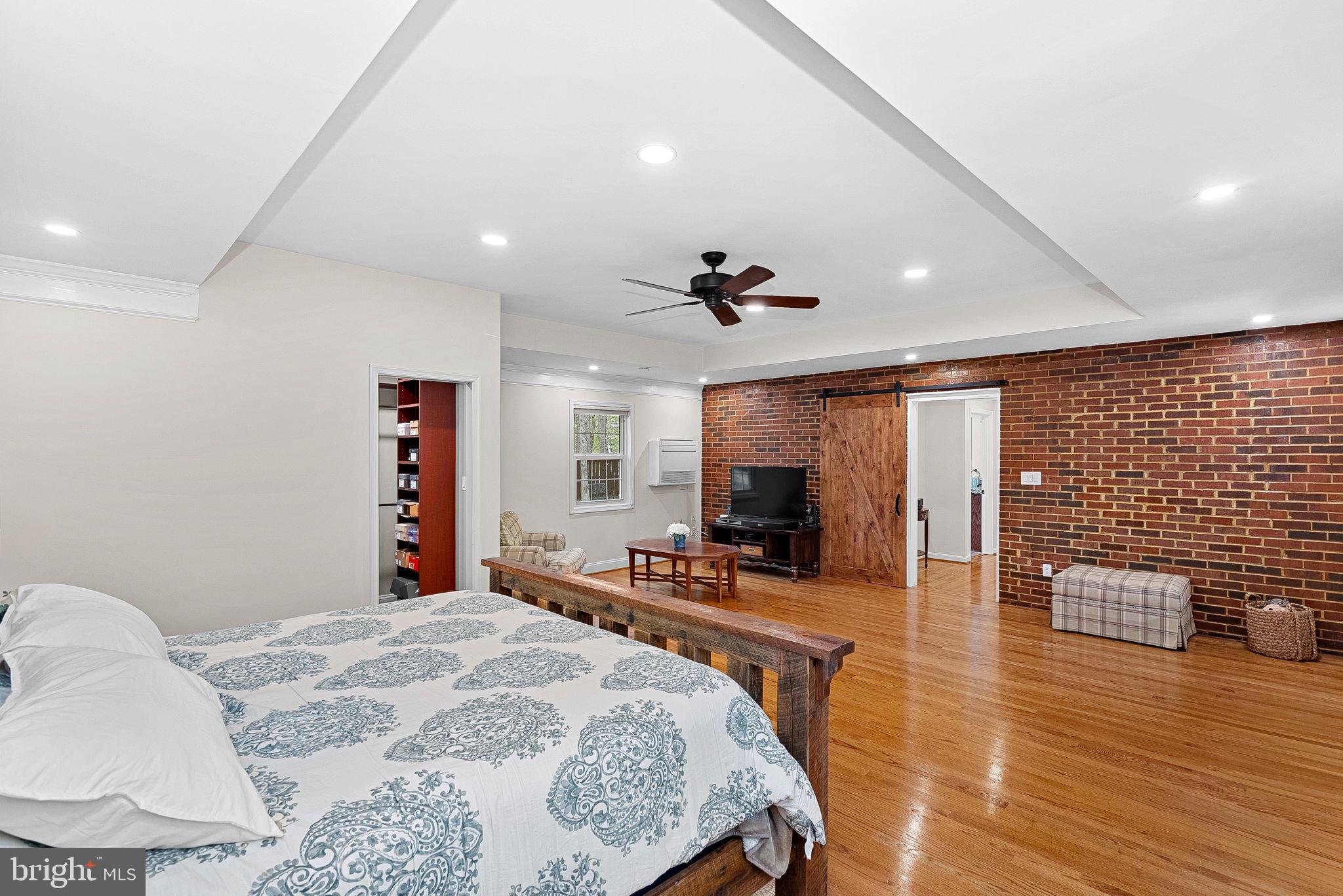 2520 Fowlers Lane Reston, VA 20191 - Photo 21 of 66 Primary Bedroom w/Exposed Brick & Barn Door