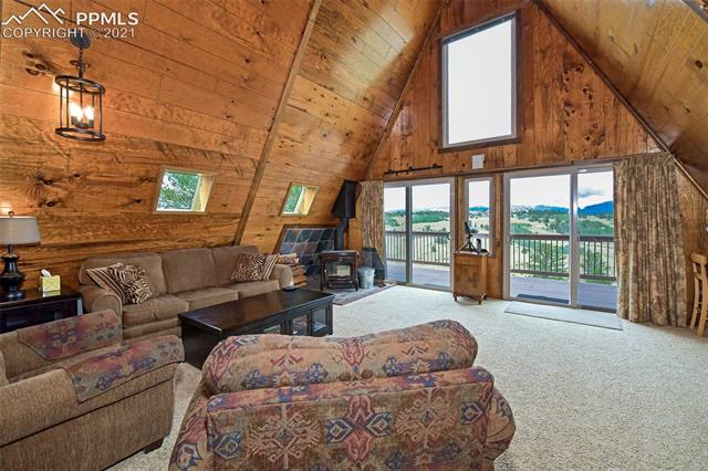 1138 Lippzana Road Como, CO 80456 - Photo 7 of 11 Great Room with Wood Burning Stove.