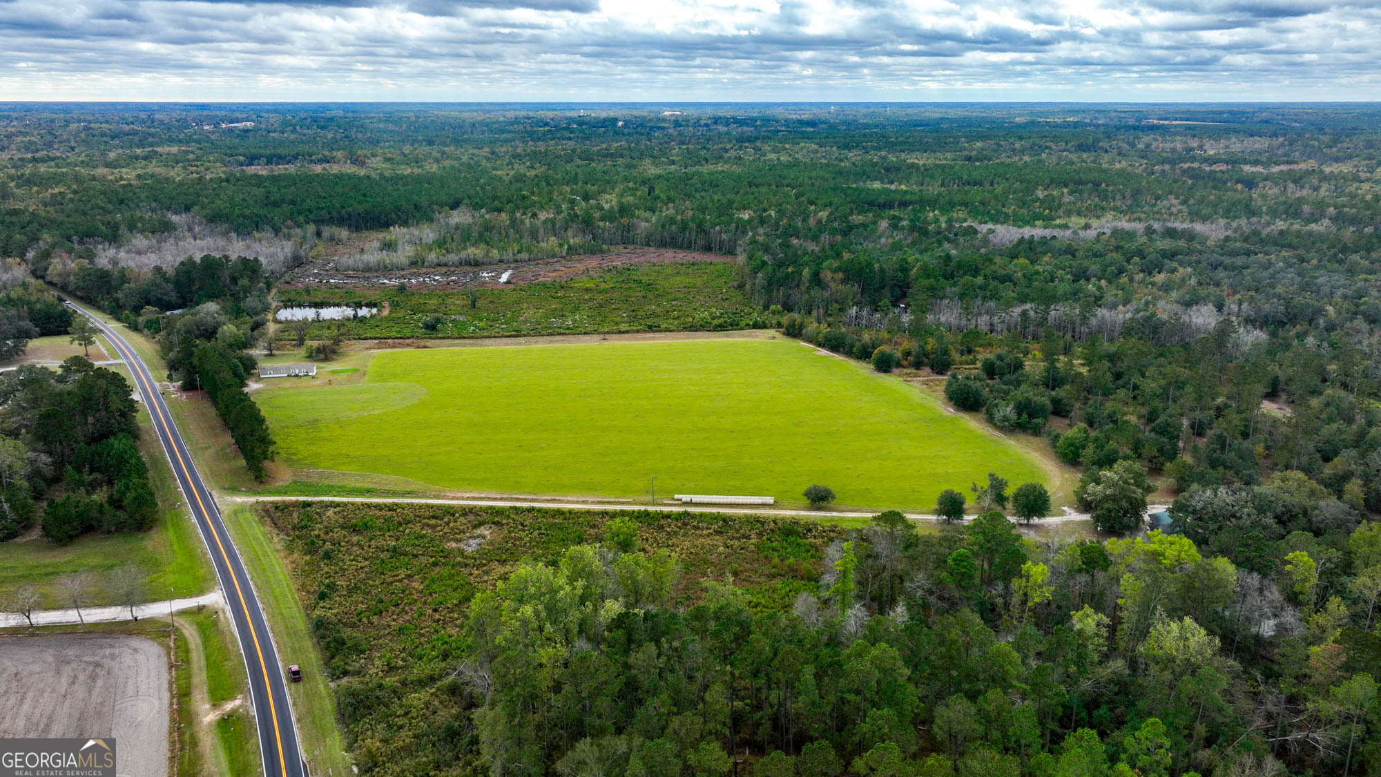 0 Hendrix Bridge Road Claxton, GA 30417 - Photo 6 of 19 a view of a field with an ocean view