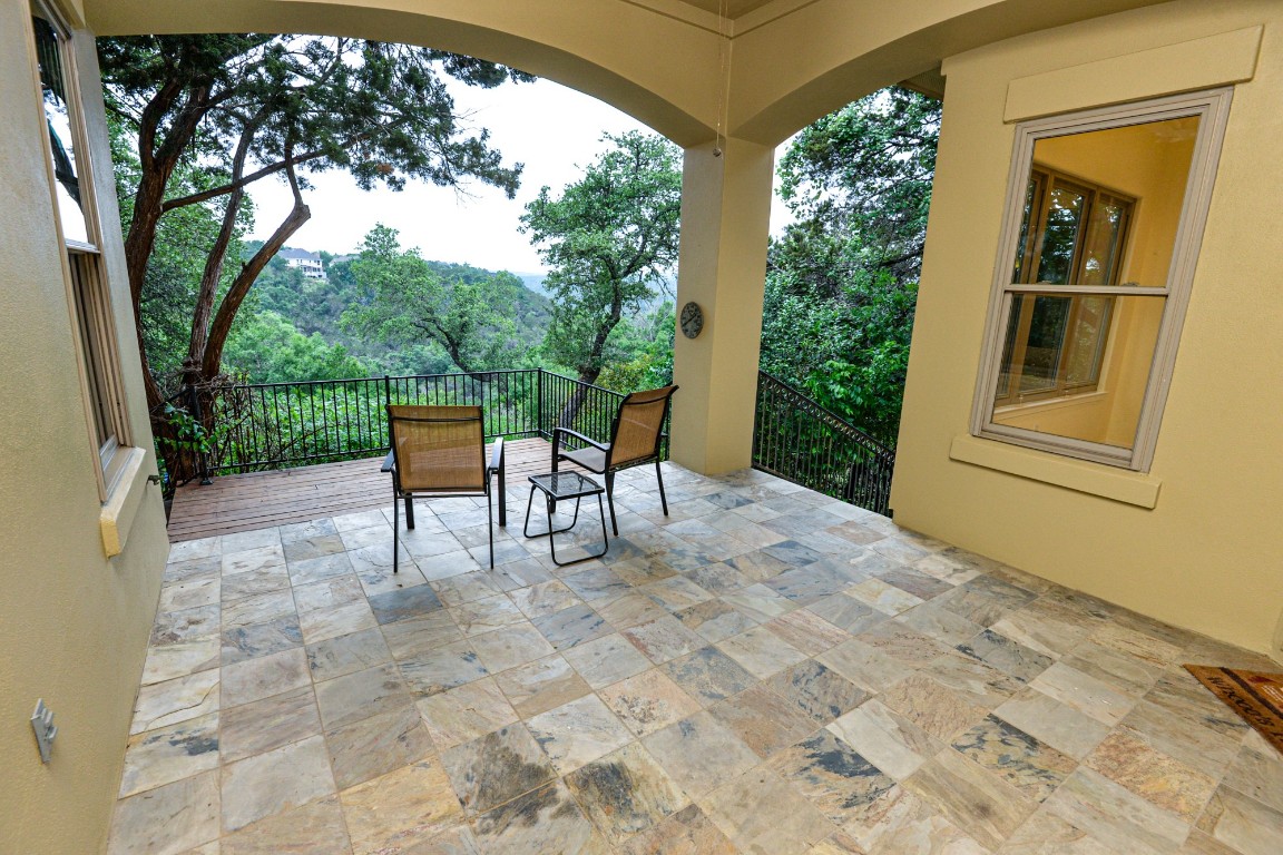 The large covered back patio allows you to enjoy the views...ALL year long!