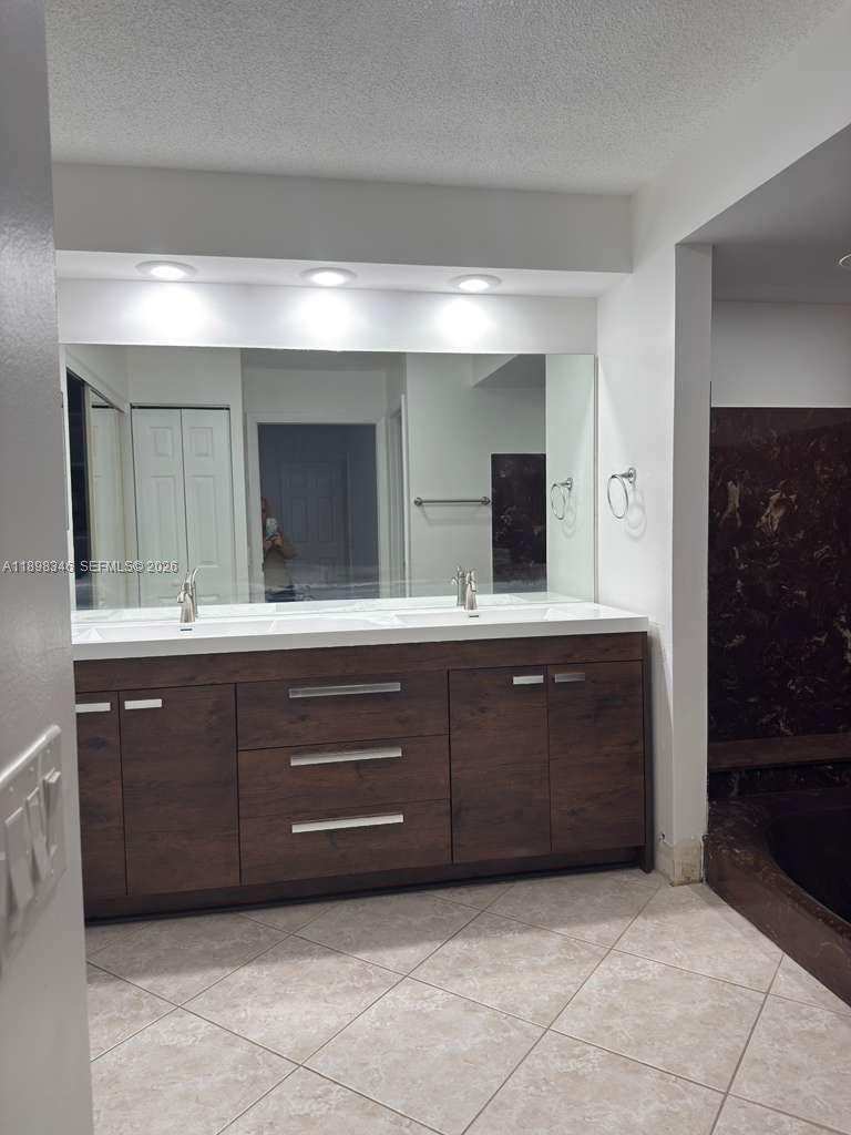 15531 Southwest 54th Terrace Miami, FL 33185 - Photo 24 of 61 a bathroom with a vanity and a sink