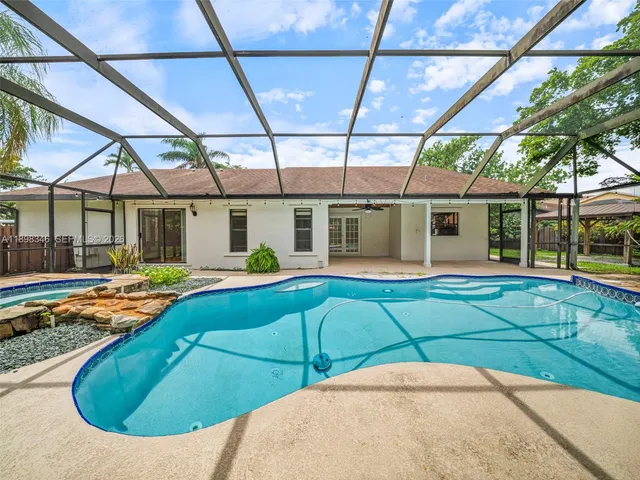 a view of a porch with a backyard