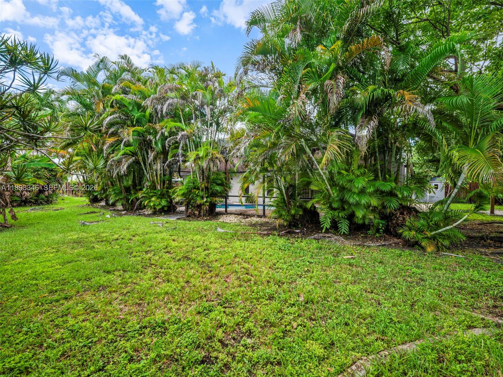 15531 Southwest 54th Terrace Miami, FL 33185 - Photo 48 of 61 a view of outdoor space with deck and yard