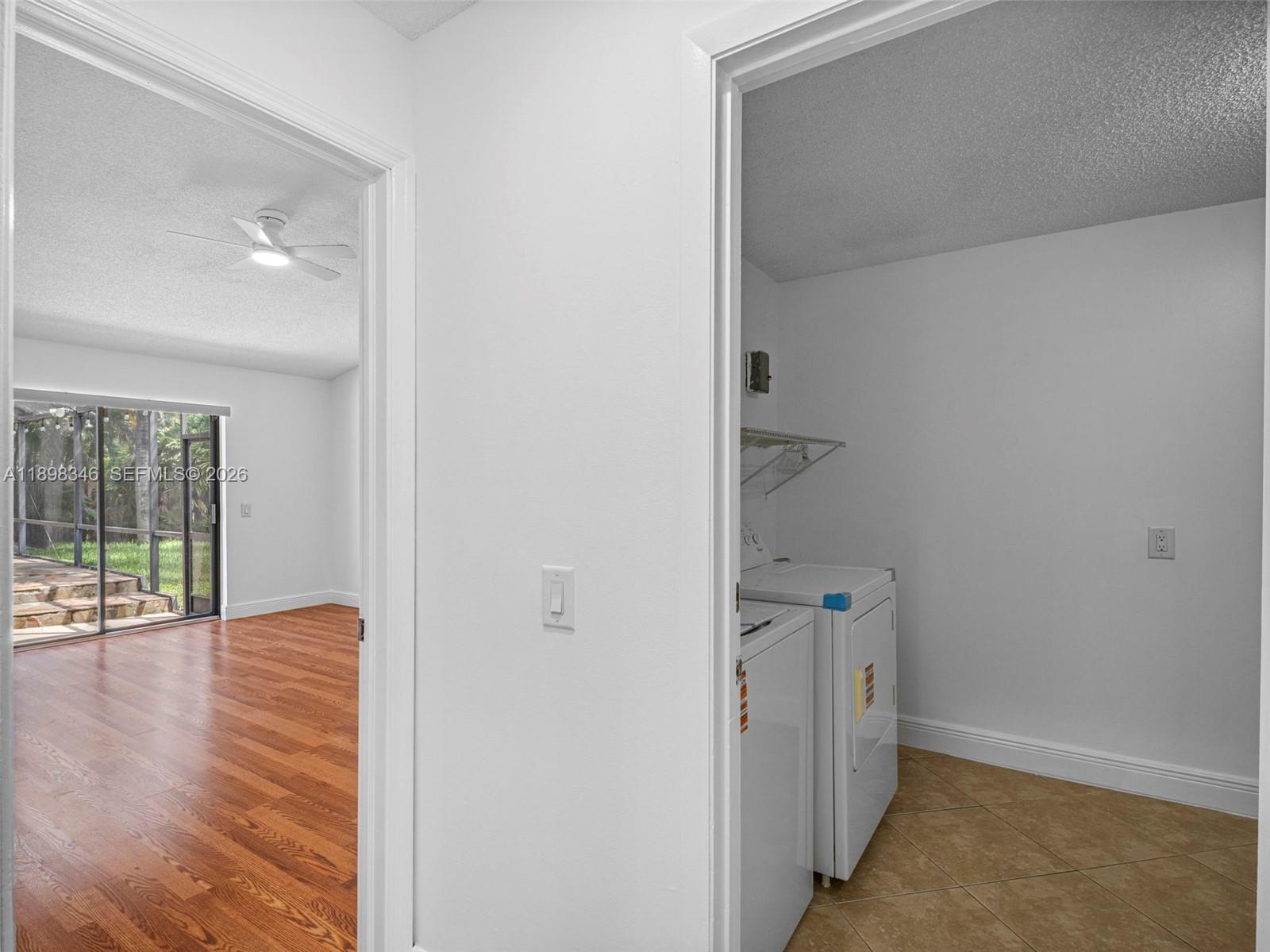 15531 Southwest 54th Terrace Miami, FL 33185 - Photo 8 of 61 a view of hallway with wooden floor