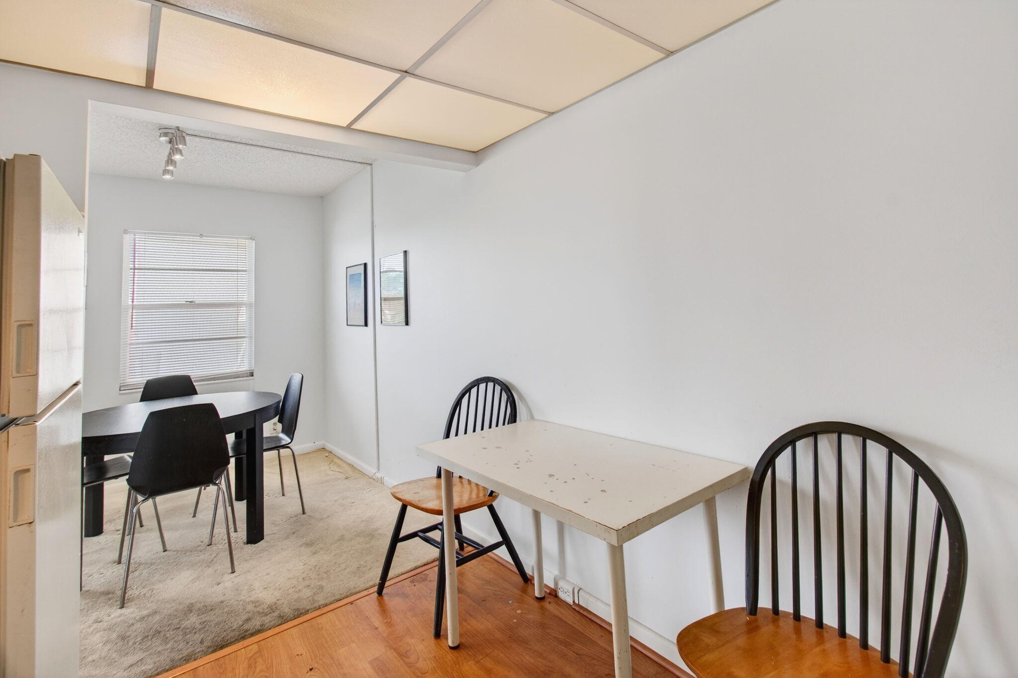 321 Fanshaw H Boca Raton, FL 33434 - Photo 19 of 92 a view of a room with furniture and wooden floor