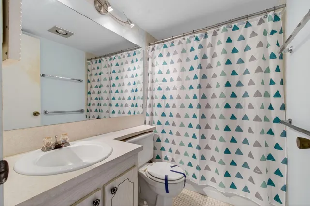 a view of a balcony with floor to ceiling windows with stairs