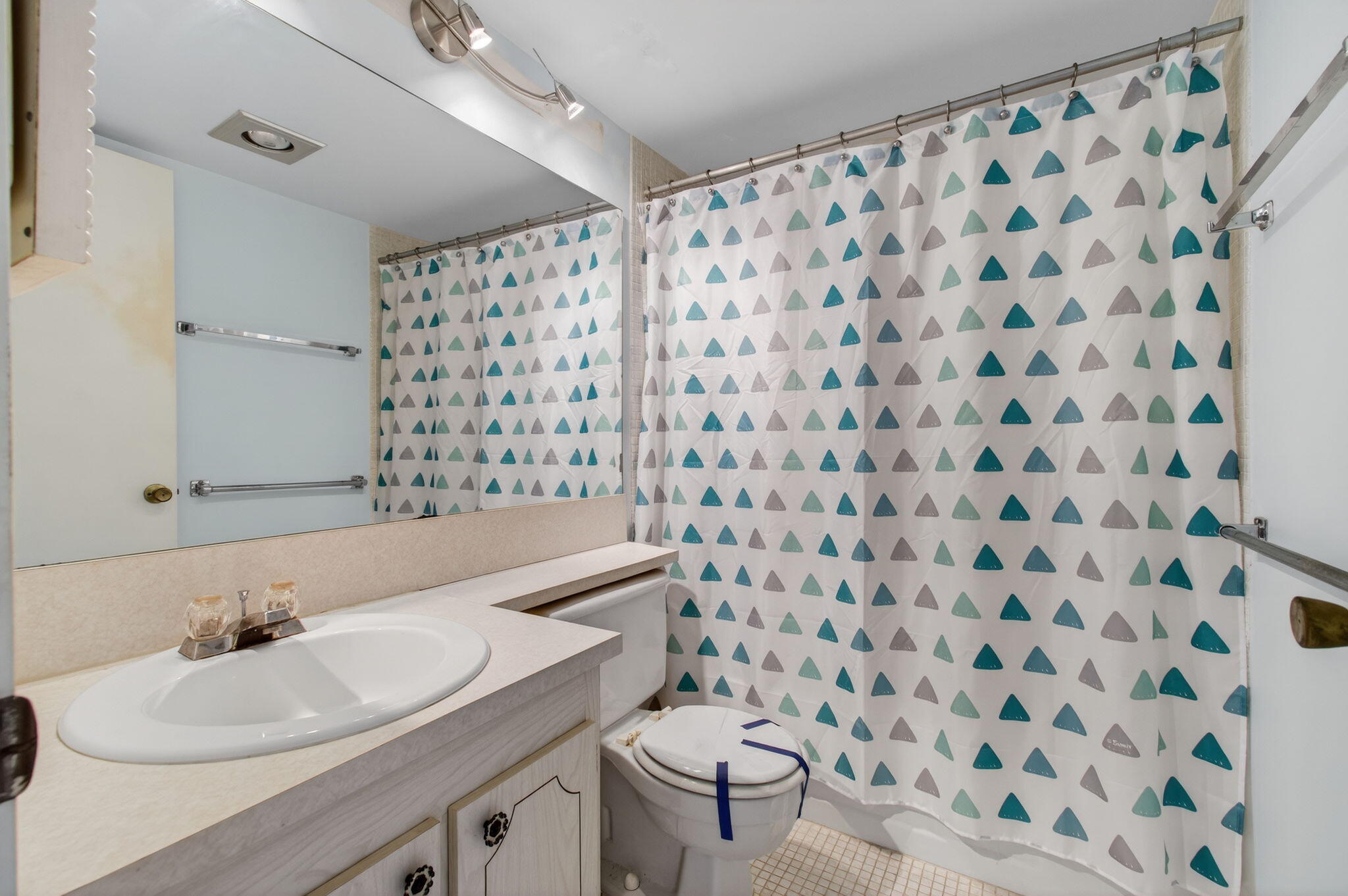 321 Fanshaw H Boca Raton, FL 33434 - Photo 26 of 92 a bathroom with a sink toilet and shower