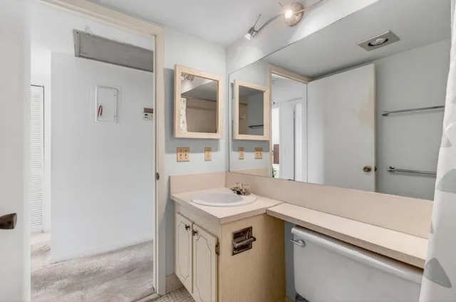 a view of yard with swimming pool outdoor seating and city view