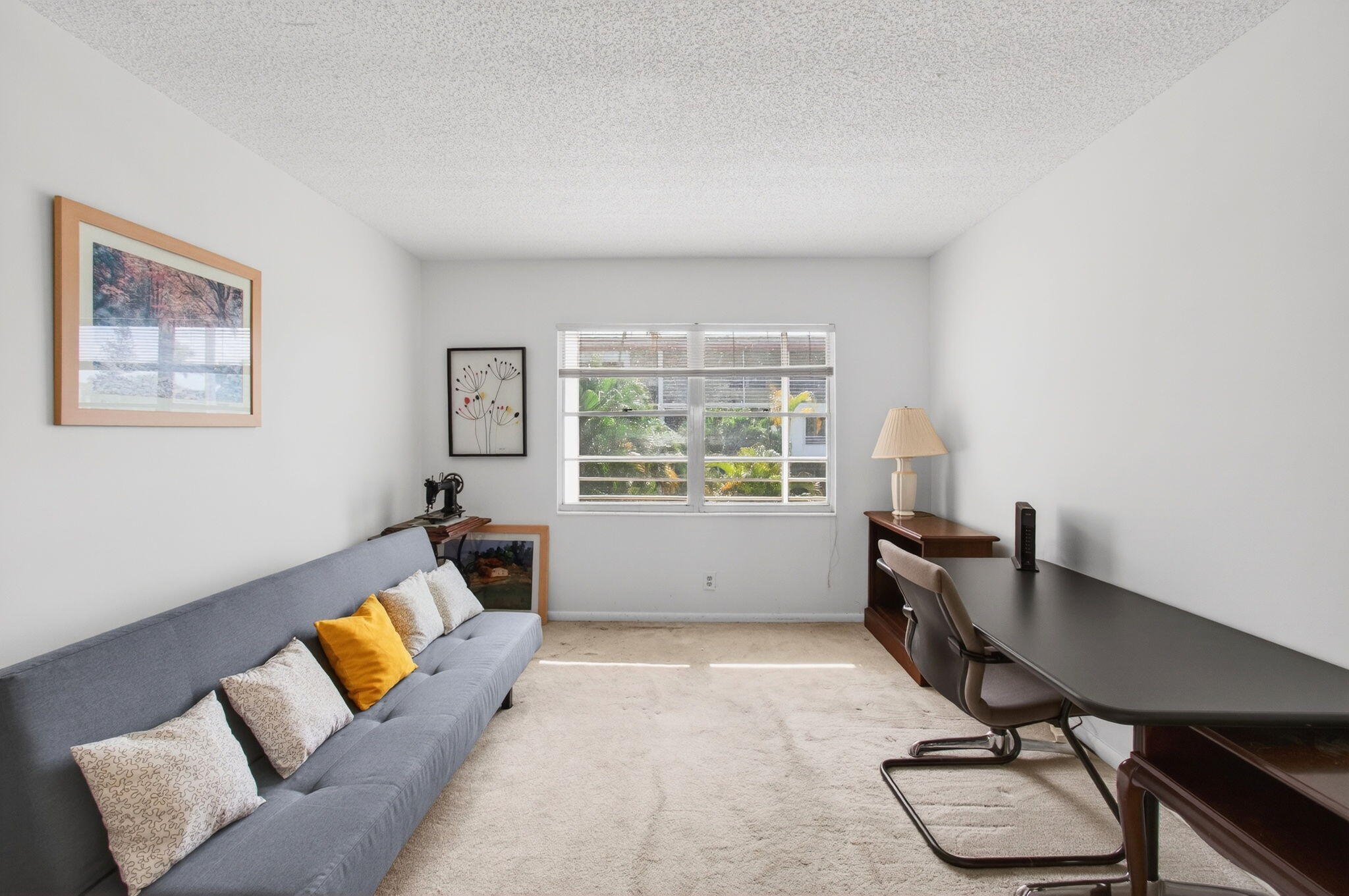 321 Fanshaw H Boca Raton, FL 33434 - Photo 36 of 92 a workspace with furniture and a window