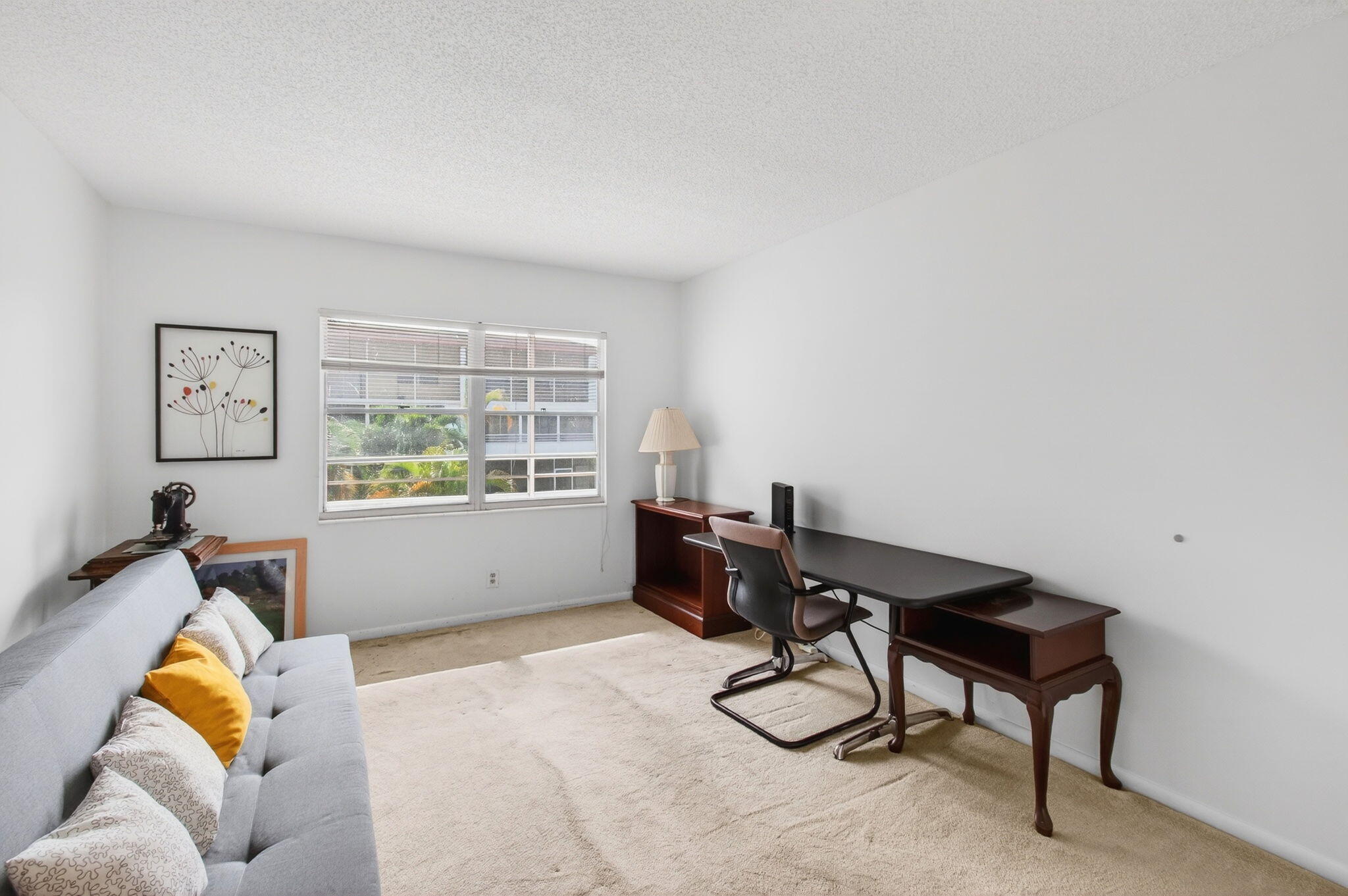 321 Fanshaw H Boca Raton, FL 33434 - Photo 37 of 92 a workspace with furniture and window