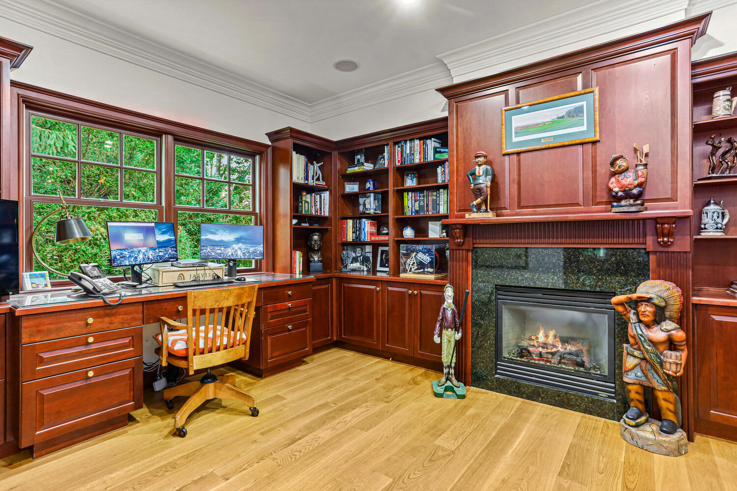 29 Old Oak Road Darien, CT 06820 - Photo 14 of 31 a living room with furniture a fireplace and a floor to ceiling window