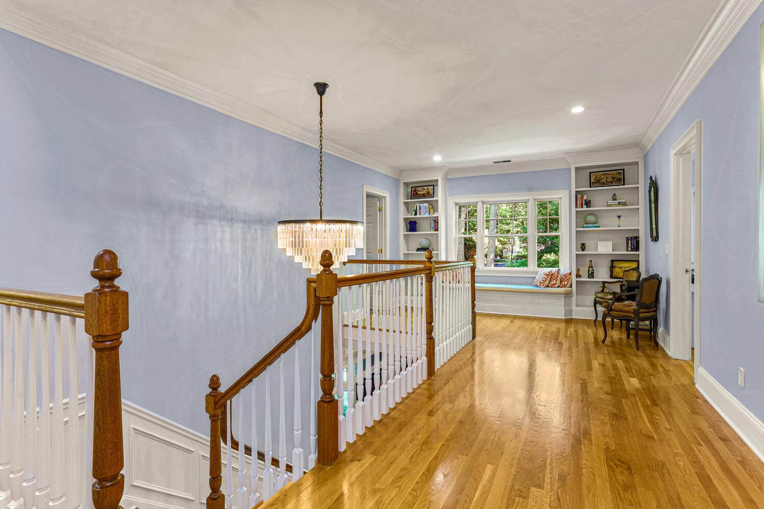 29 Old Oak Road Darien, CT 06820 - Photo 17 of 31 a view of a hallway with wooden floor and furniture