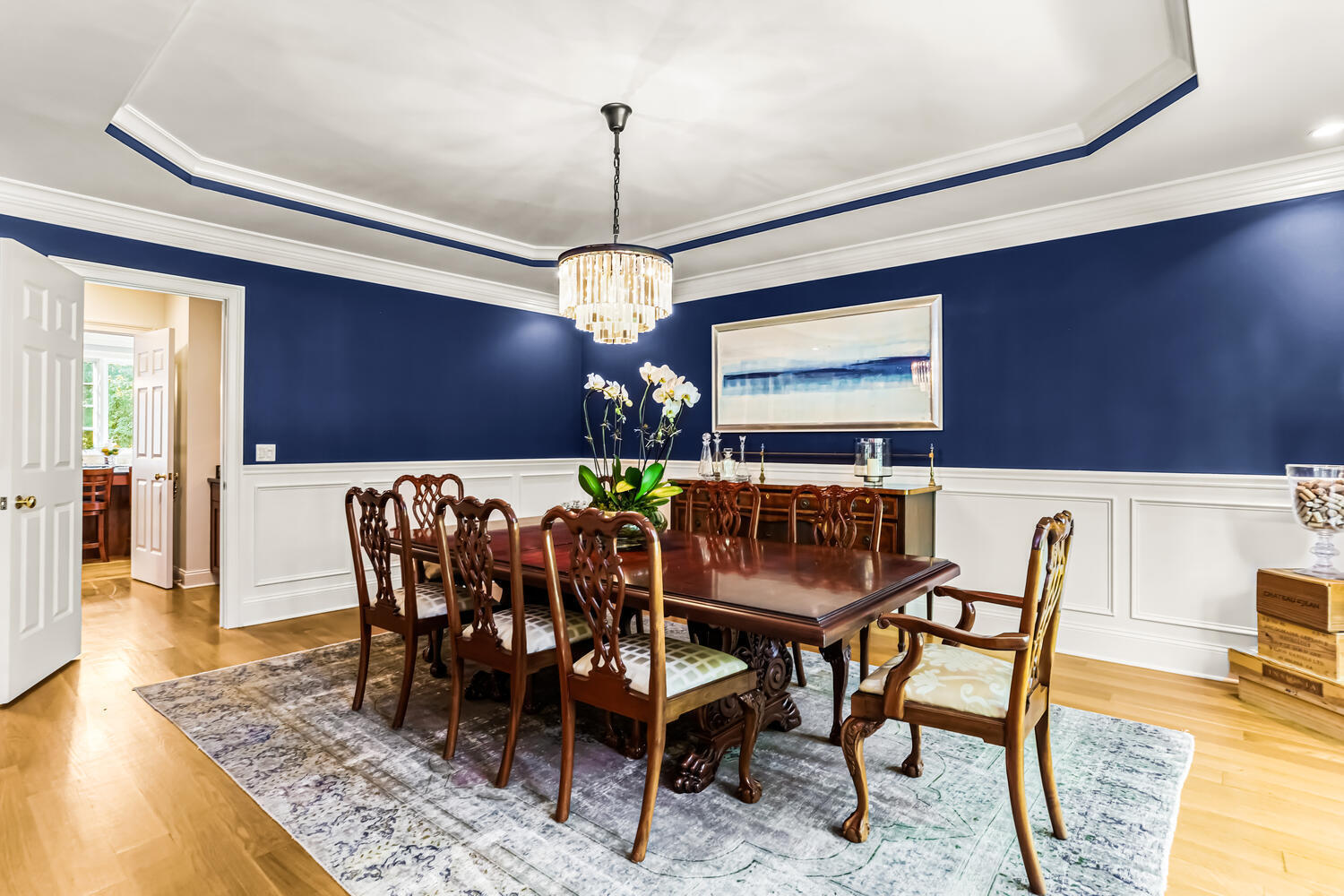29 Old Oak Road Darien, CT 06820 - Photo 7 of 31 a dining room with furniture a rug and a chandelier