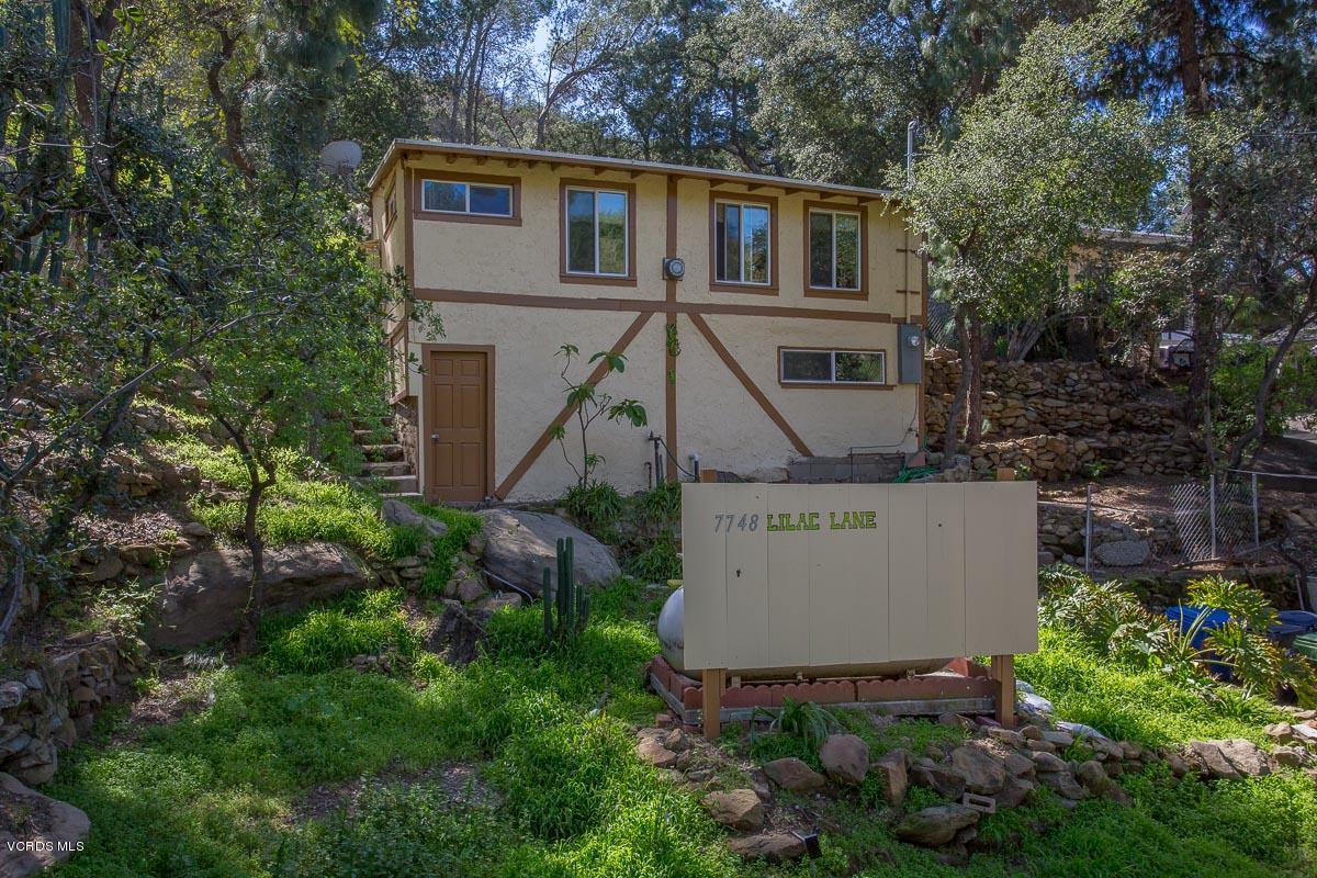 7748 Lilac Lane Simi Valley, CA 93063 - Photo 1 of 18 front view of a house with a yard
