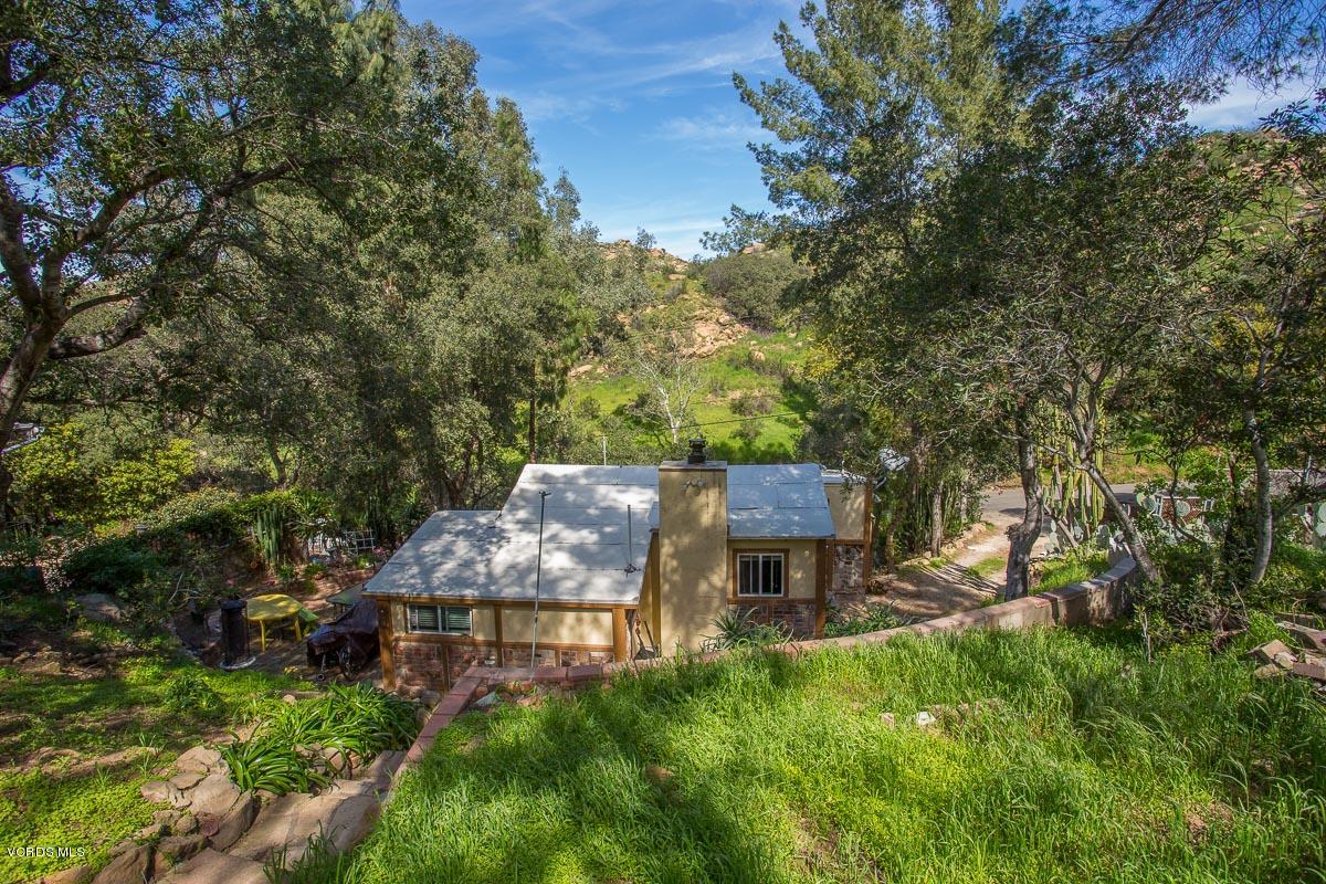 7748 Lilac Lane Simi Valley, CA 93063 - Photo 5 of 18 an aerial view of a house with backyard garden and patio