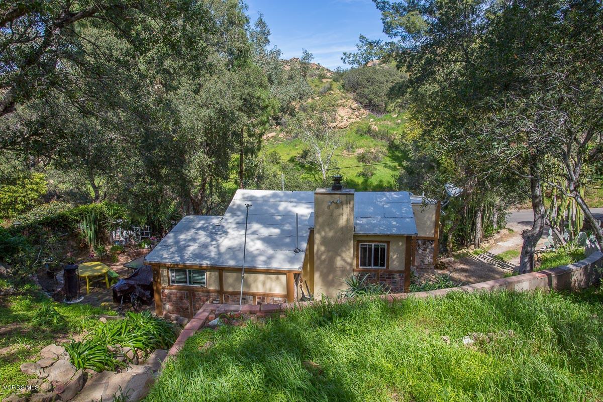 7748 Lilac Lane Simi Valley, CA 93063 - Photo 6 of 18 an aerial view of a house with a yard large tree and a yard