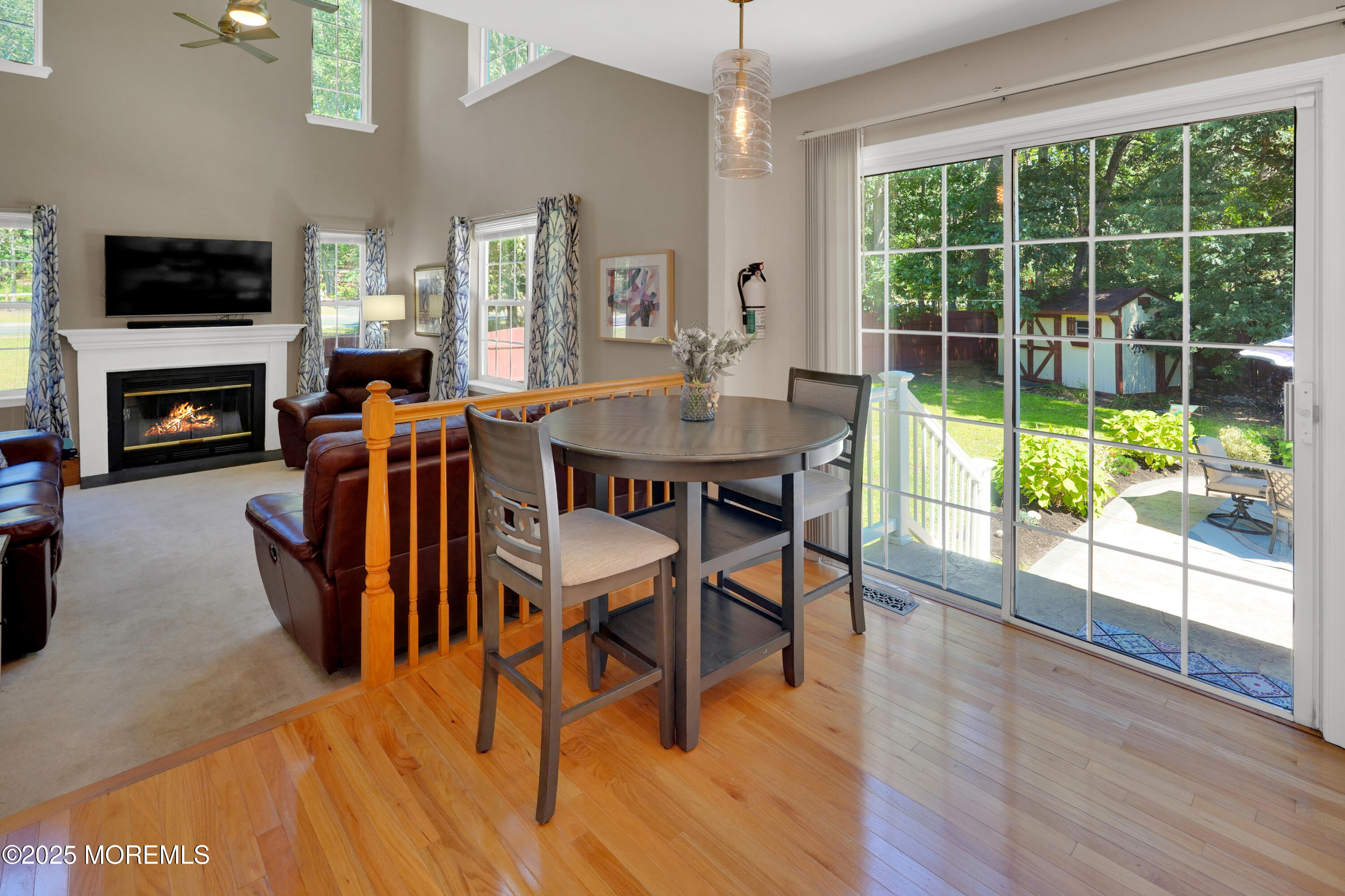 3 Diamond Lane Howell, NJ 07731 - Photo 11 of 43 a view of a dining room with furniture window and wooden floor