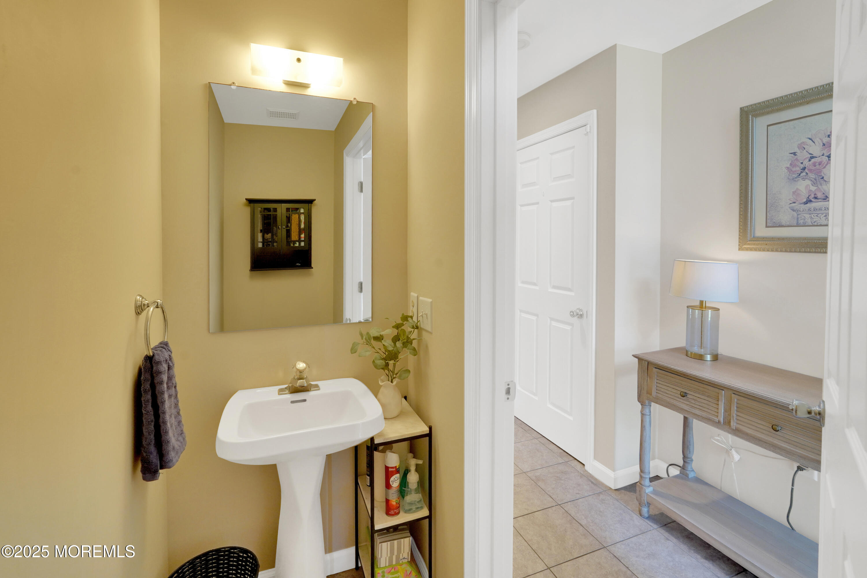 3 Diamond Lane Howell, NJ 07731 - Photo 15 of 43 a bathroom with a sink and a mirror