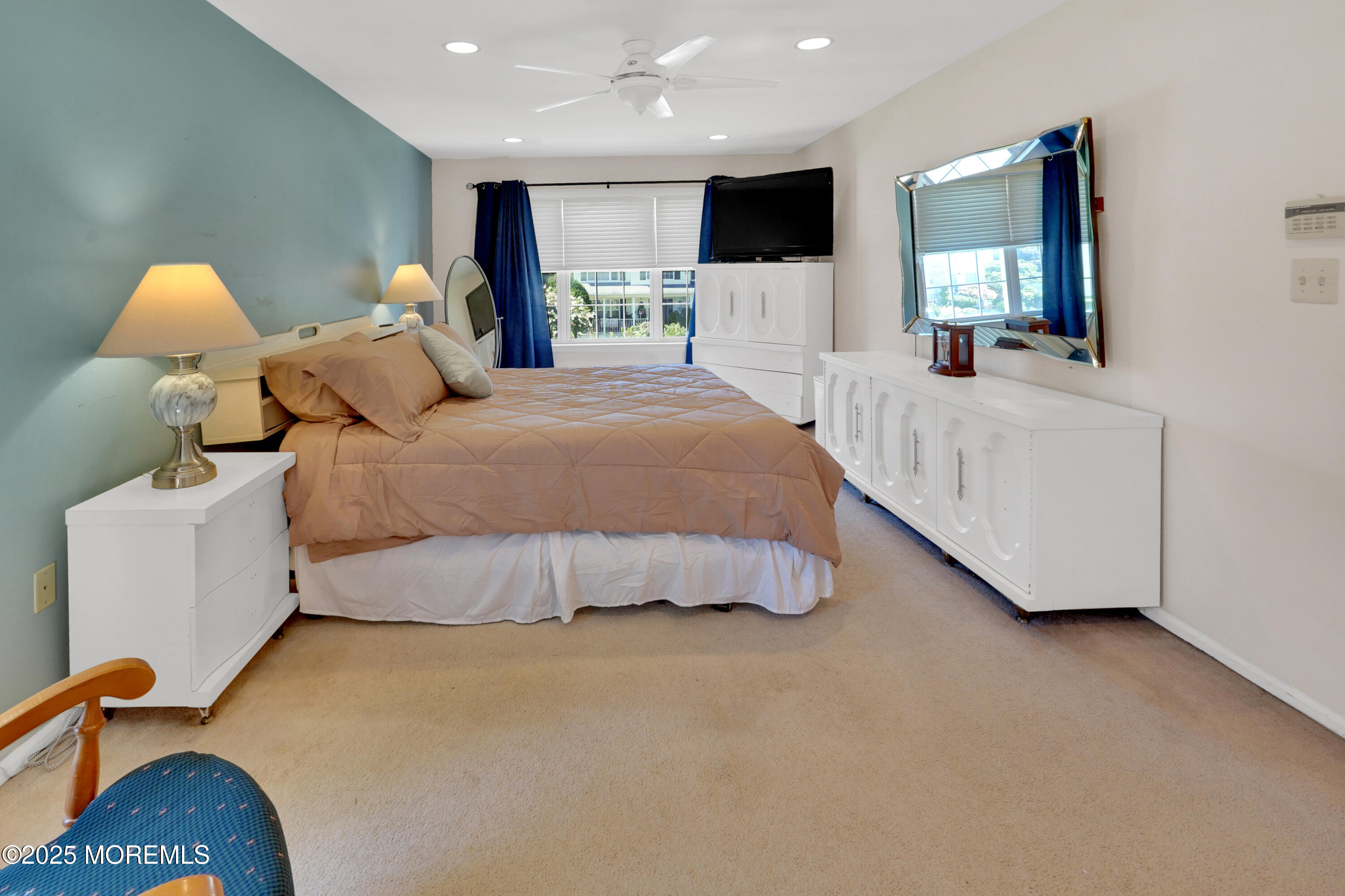 3 Diamond Lane Howell, NJ 07731 - Photo 18 of 43 a bed room with a bed mirror and couch